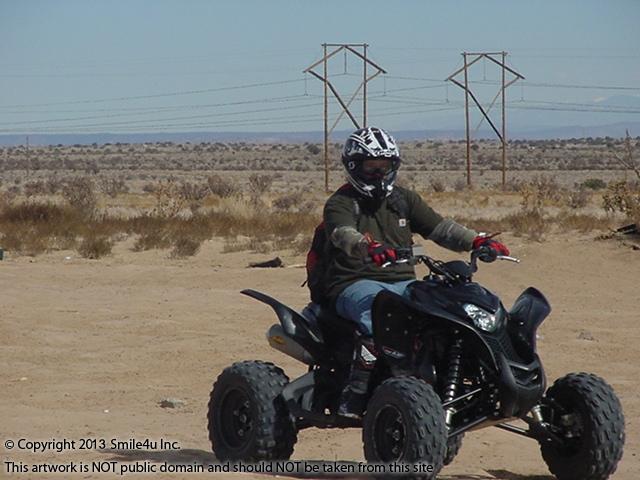 We saw someone out having fun on their quad just down the road from this property for sale in Rio Rancho Estates Unit 3 when exploring land for sale just off southern and 60th street in Sandoval County! He put on a nice show for me in February 2013! I have been told by many of the locals that they have played on their ATV
